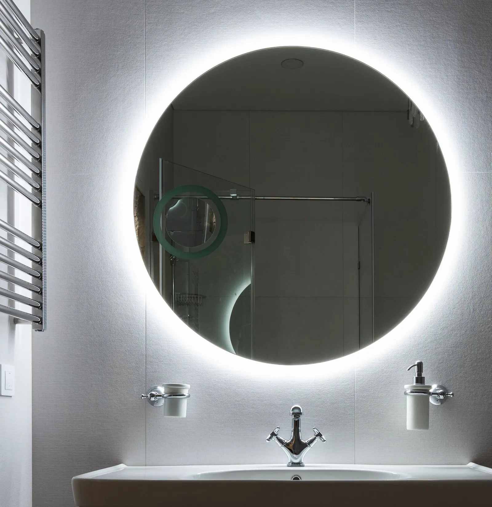Bathroom with a backlit LED mirror