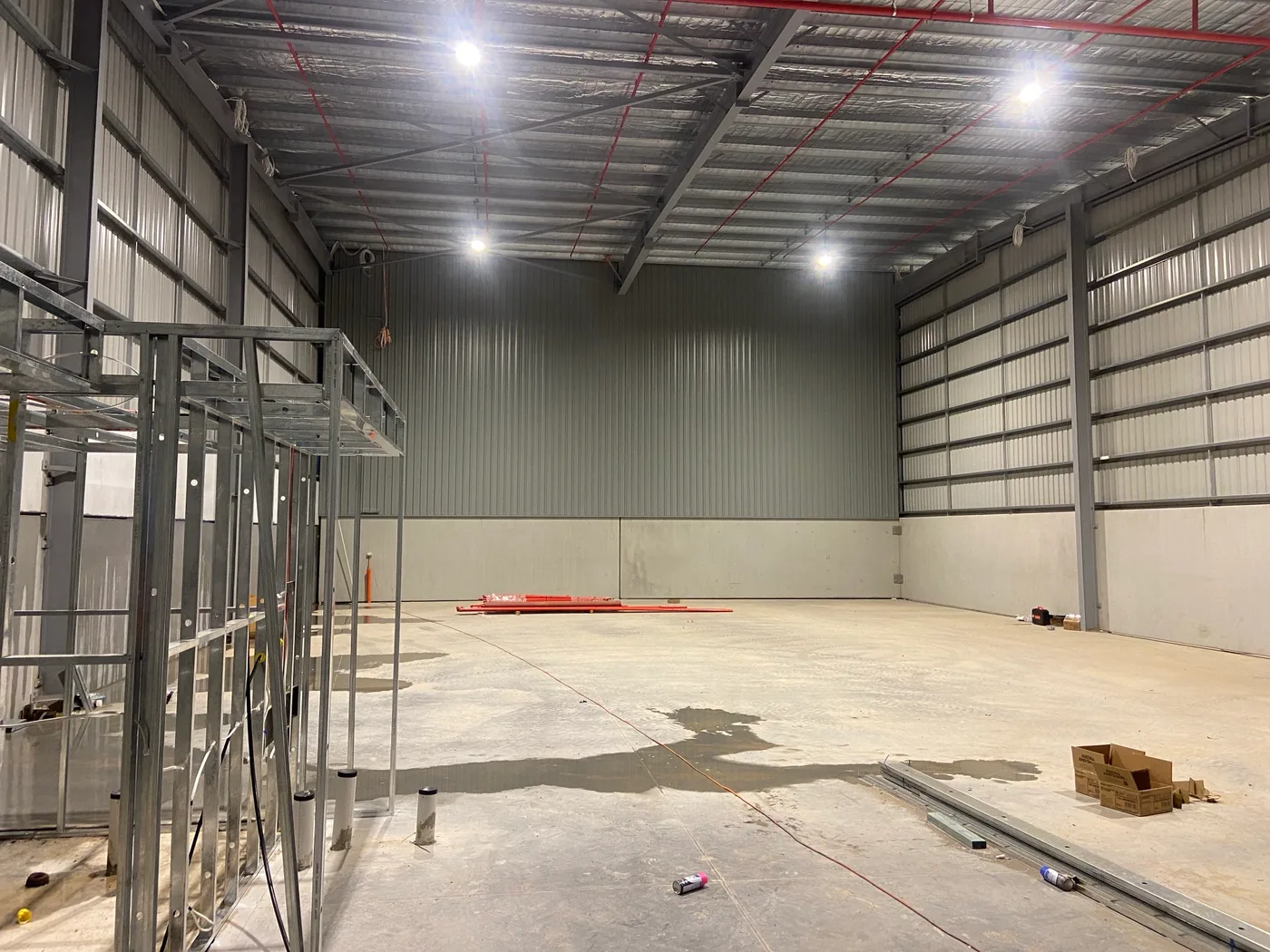 After: finished warehouse unit with high-bay LED lighting