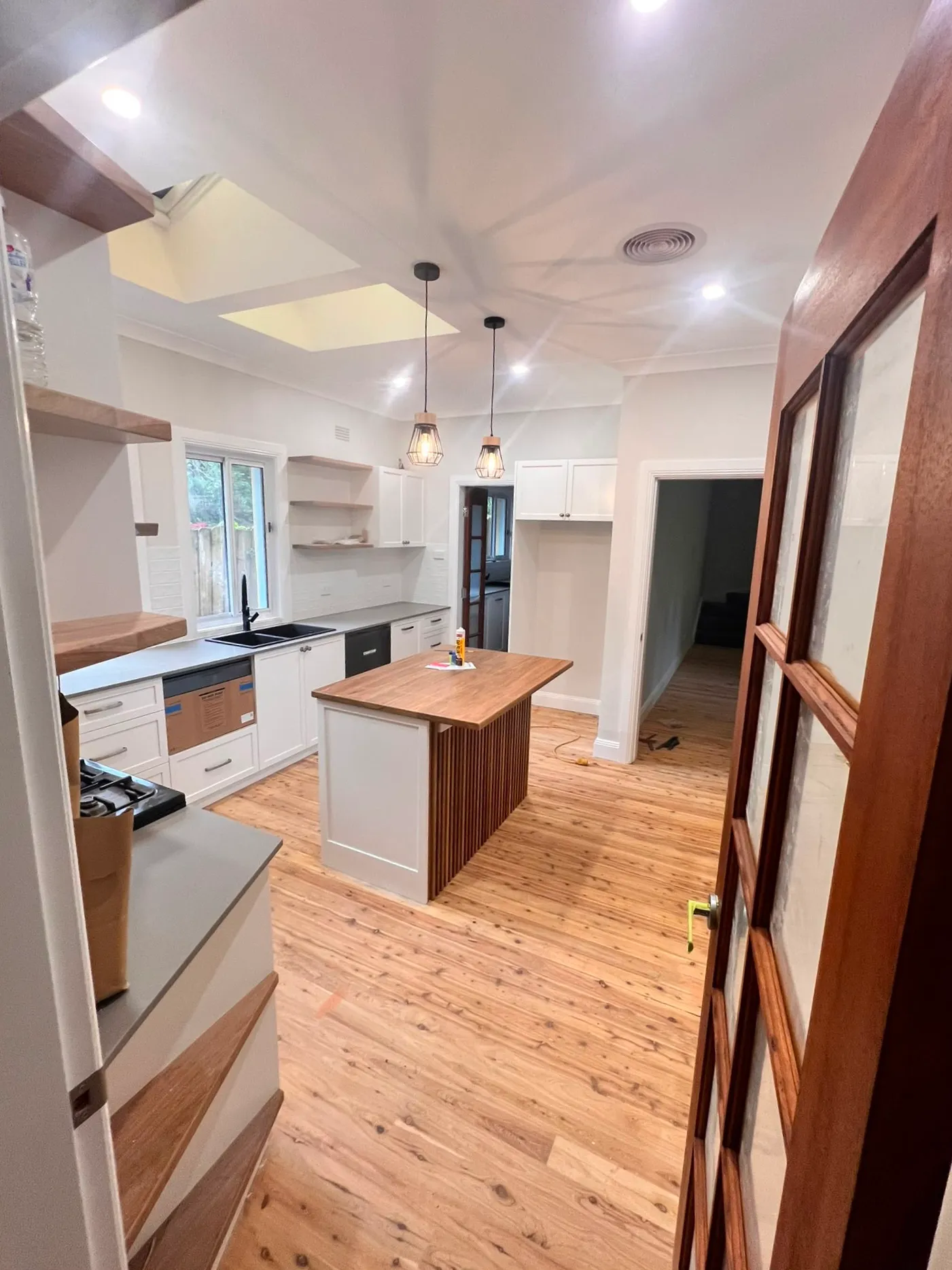 Finished kitchen renovation with new lighting