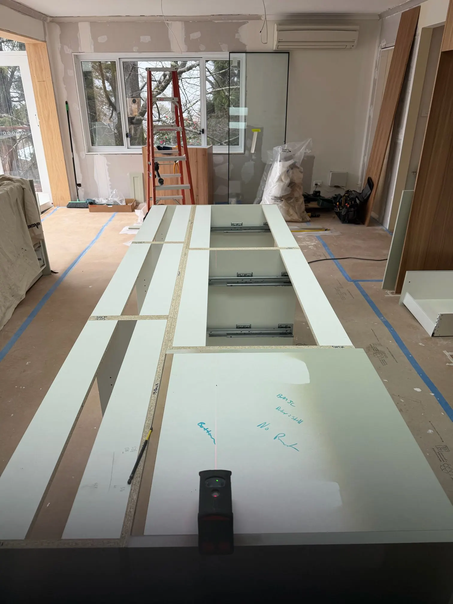Kitchen during renovation, wired before the benches go in