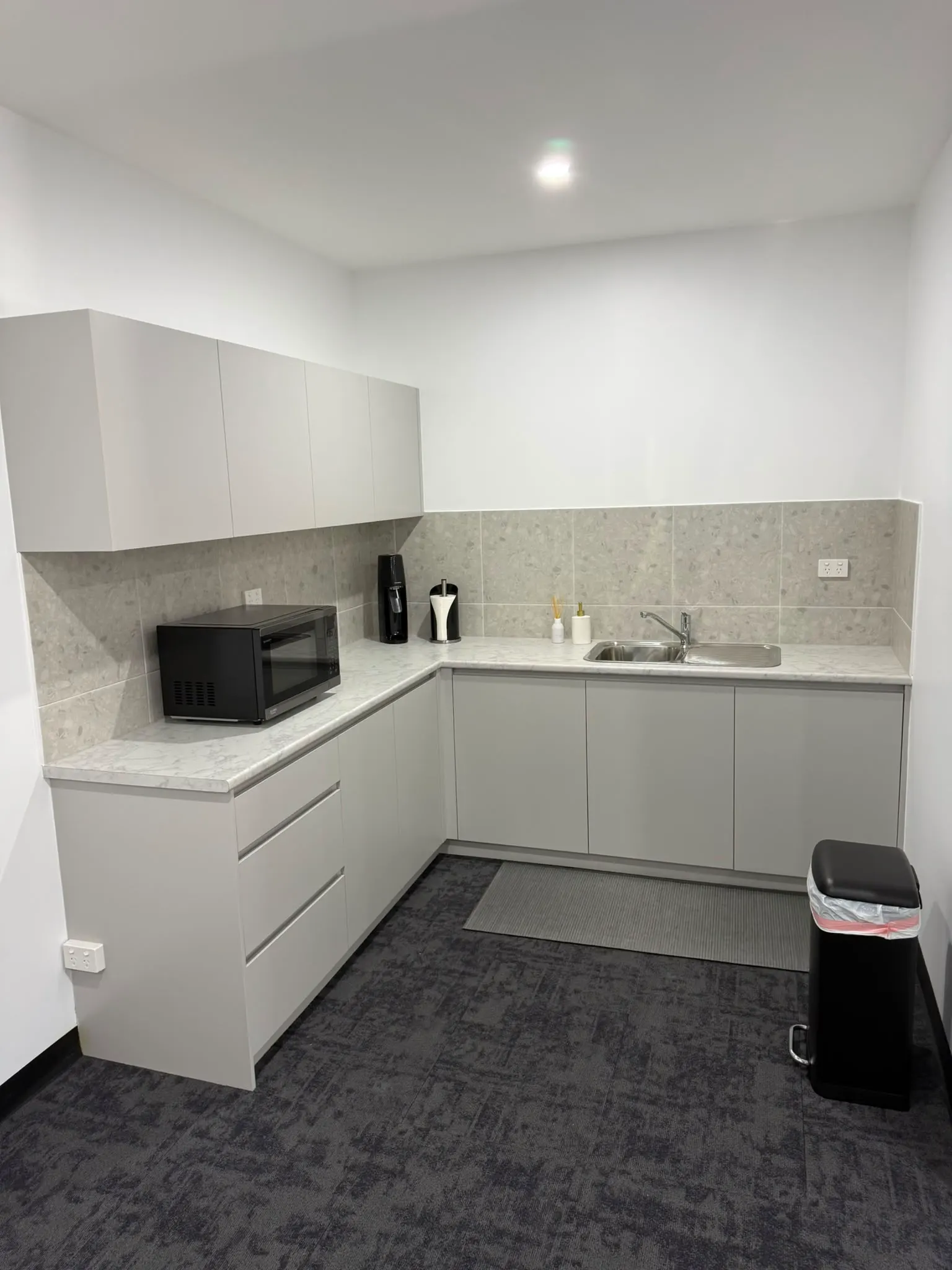 Office kitchenette with new downlights and power