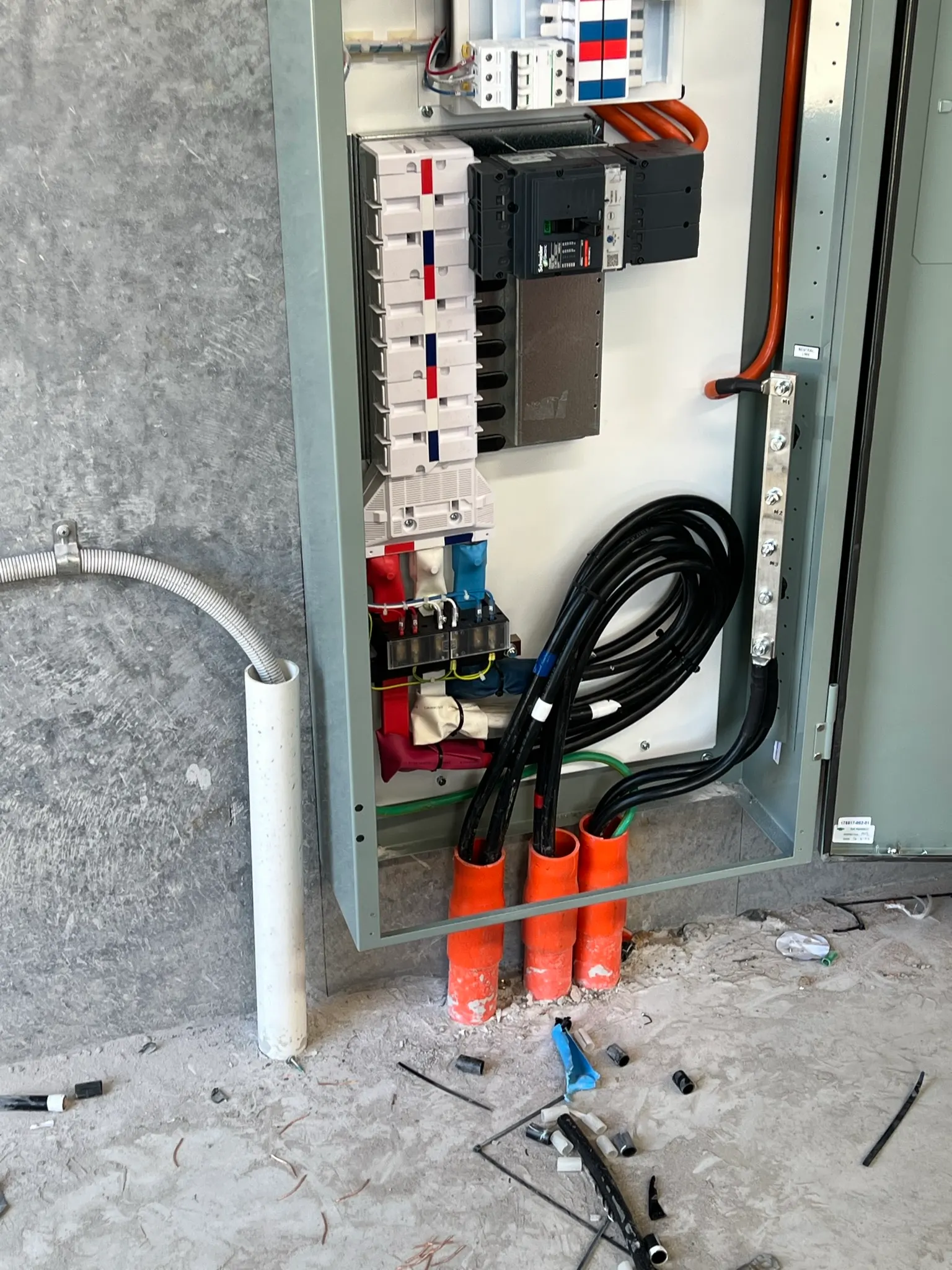 Switchboard being wired with new circuits