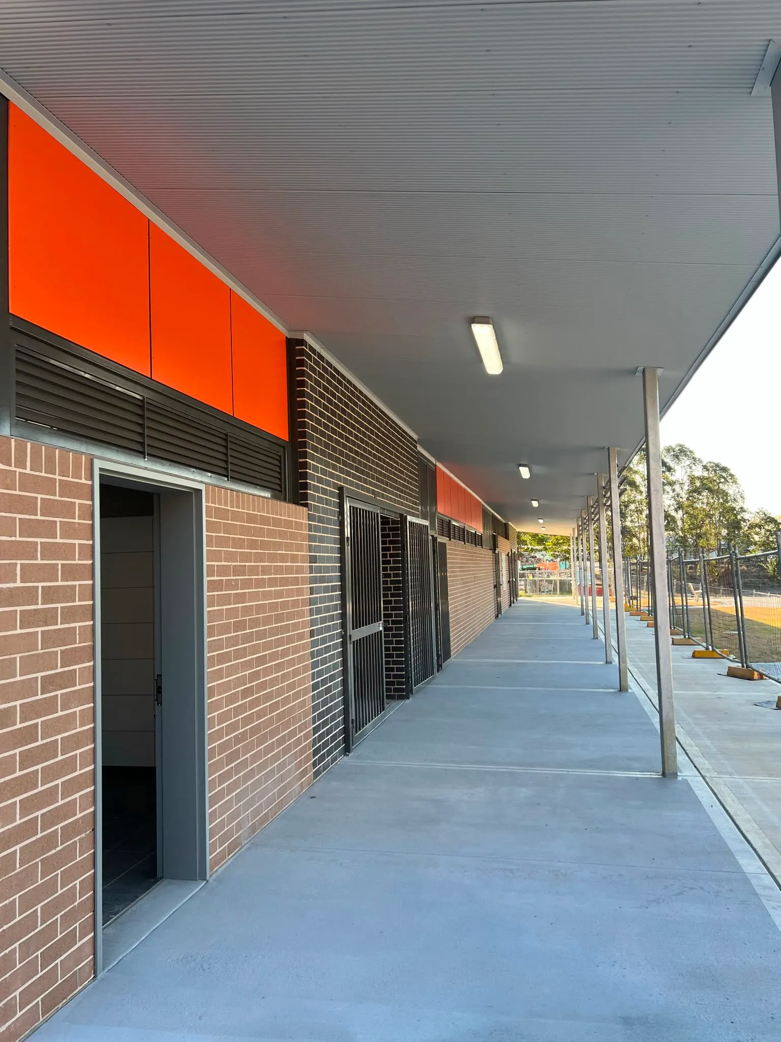 Commercial walkway with ceiling lights