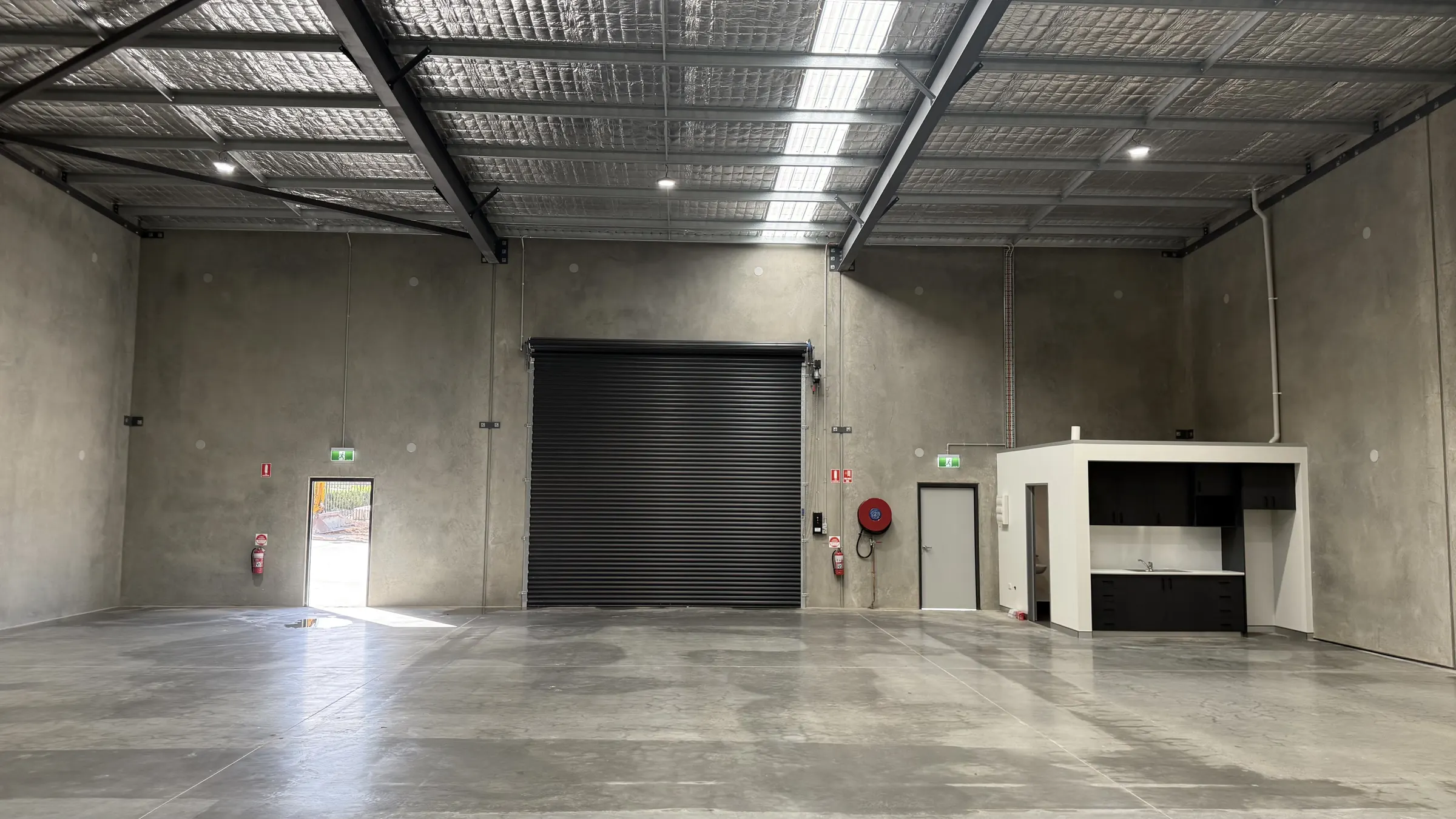 Finished warehouse unit with lighting and power